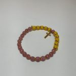 PULSERA MISTERIO ROSA+AMARILLO C/CASQ
